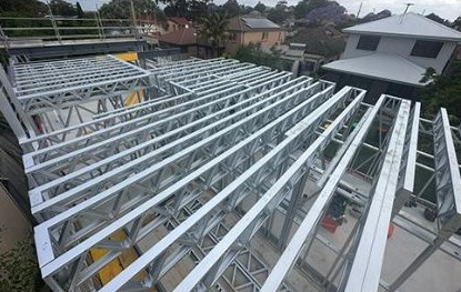 Steel roof truss installation